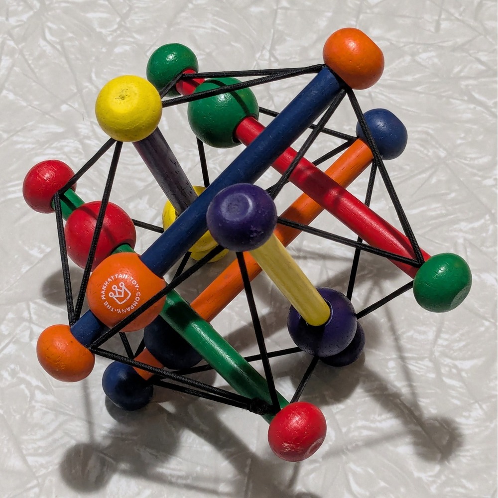 Manhattan‎ Toy Skwish Classic Wooden Rattle and Teether Grasping Activity Toy